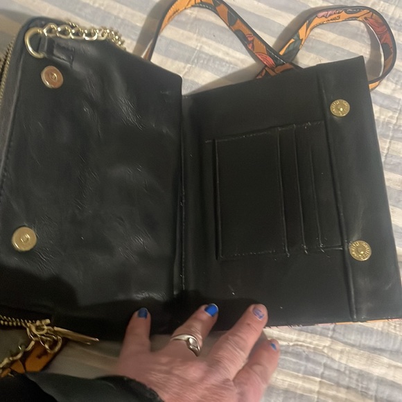 Steve Madden purse 9 inches wide, 8 inches deep opens up into three 60”strap - Picture 4 of 5